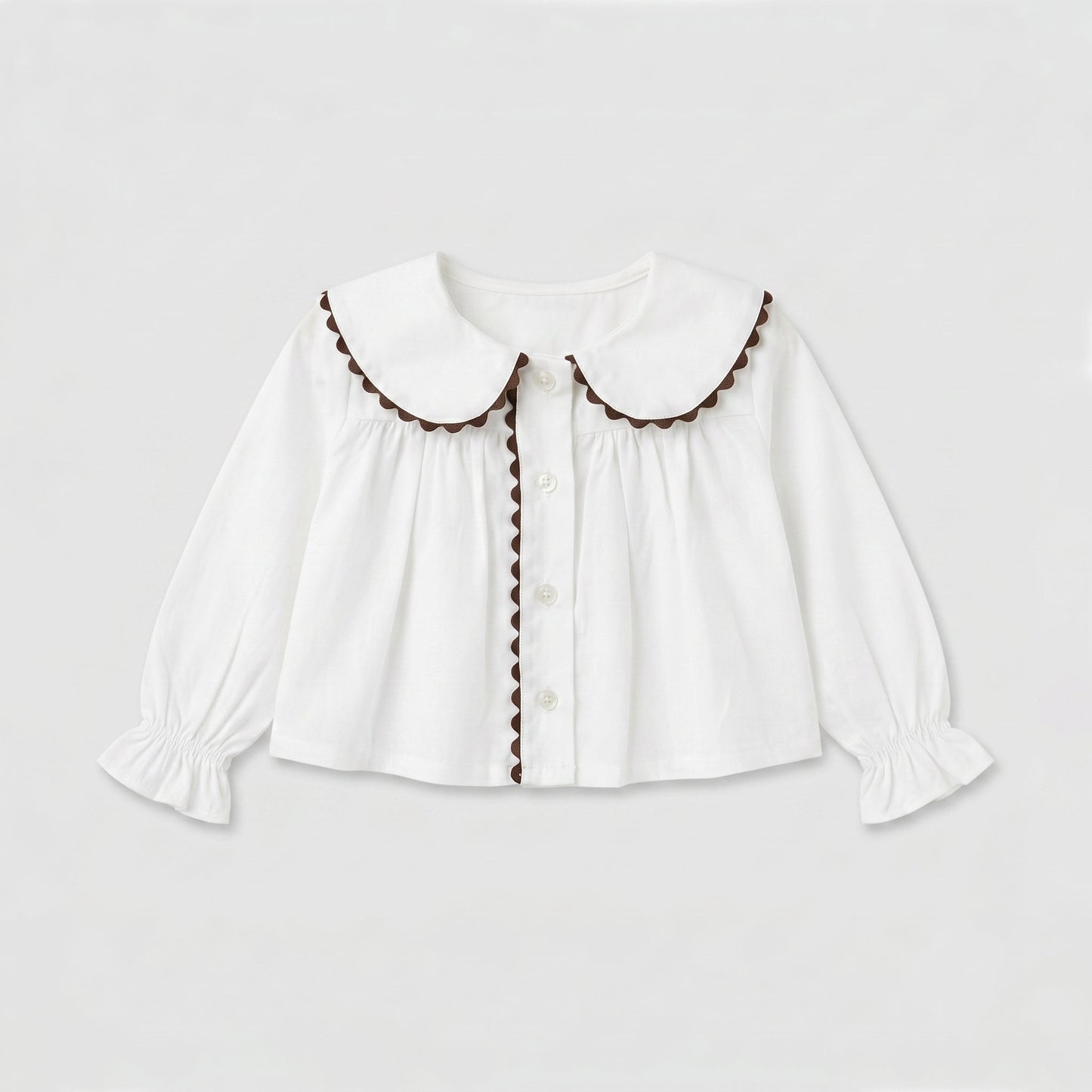 Blusa Peter Pan blanca y chocolate