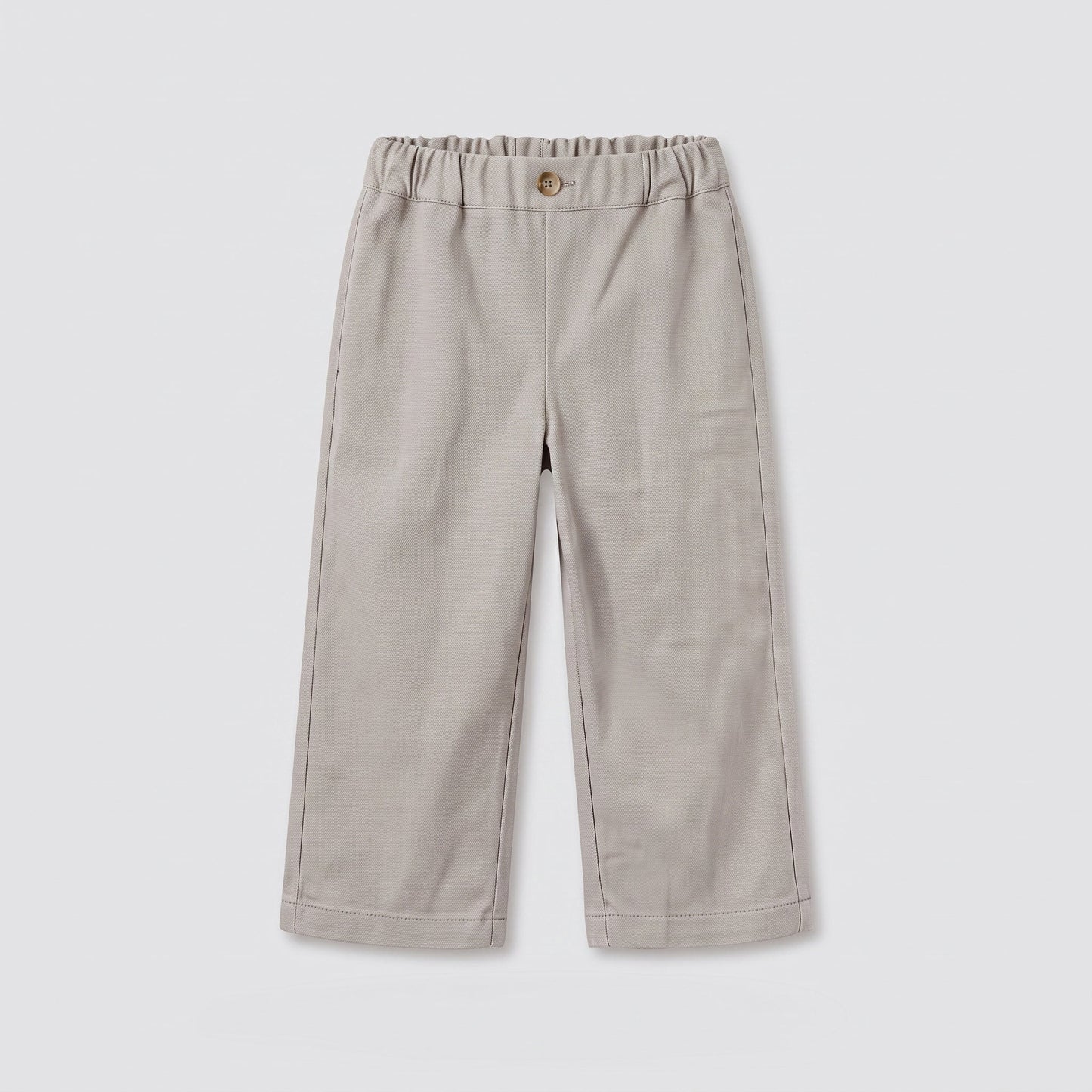 Pantalón beige bolsillos bordados