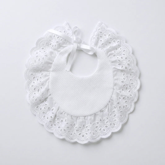 Babero redondo con puntilla flores