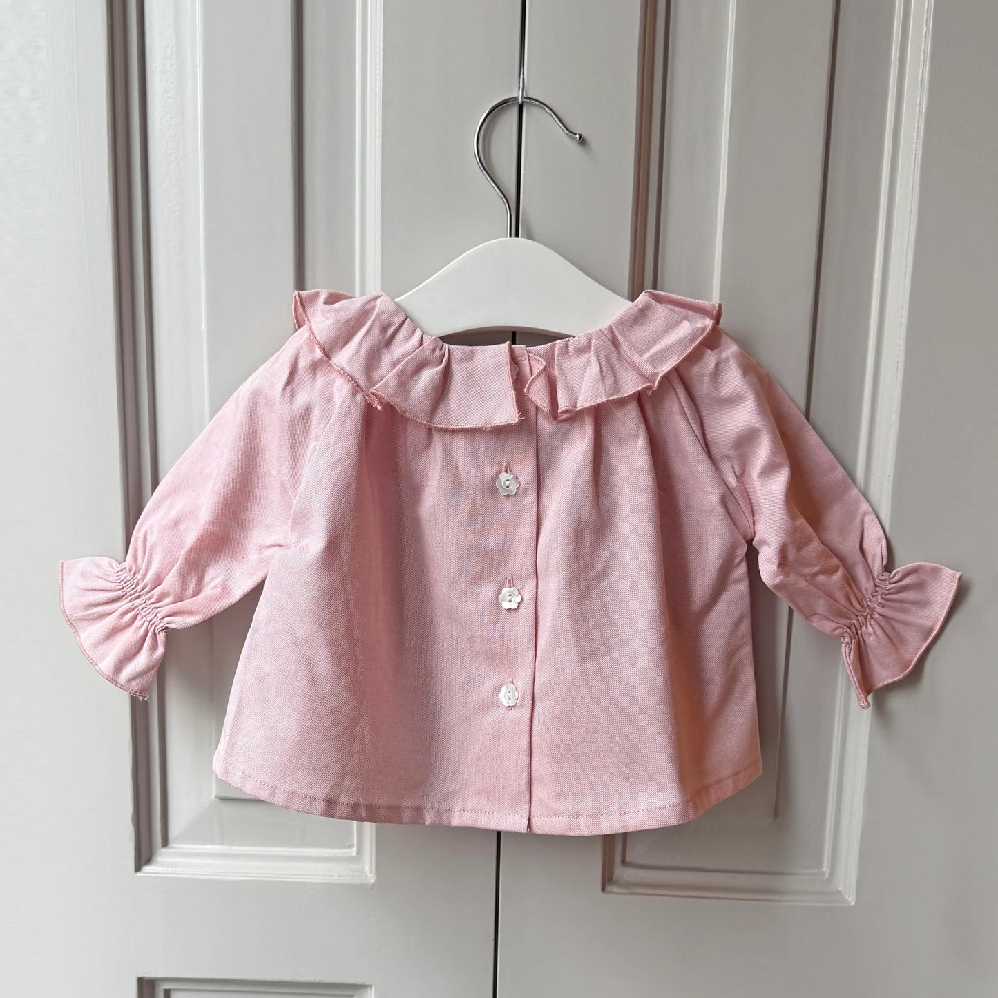 Blusa cuello corazón rosa