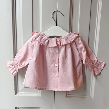 Blusa cuello corazón rosa