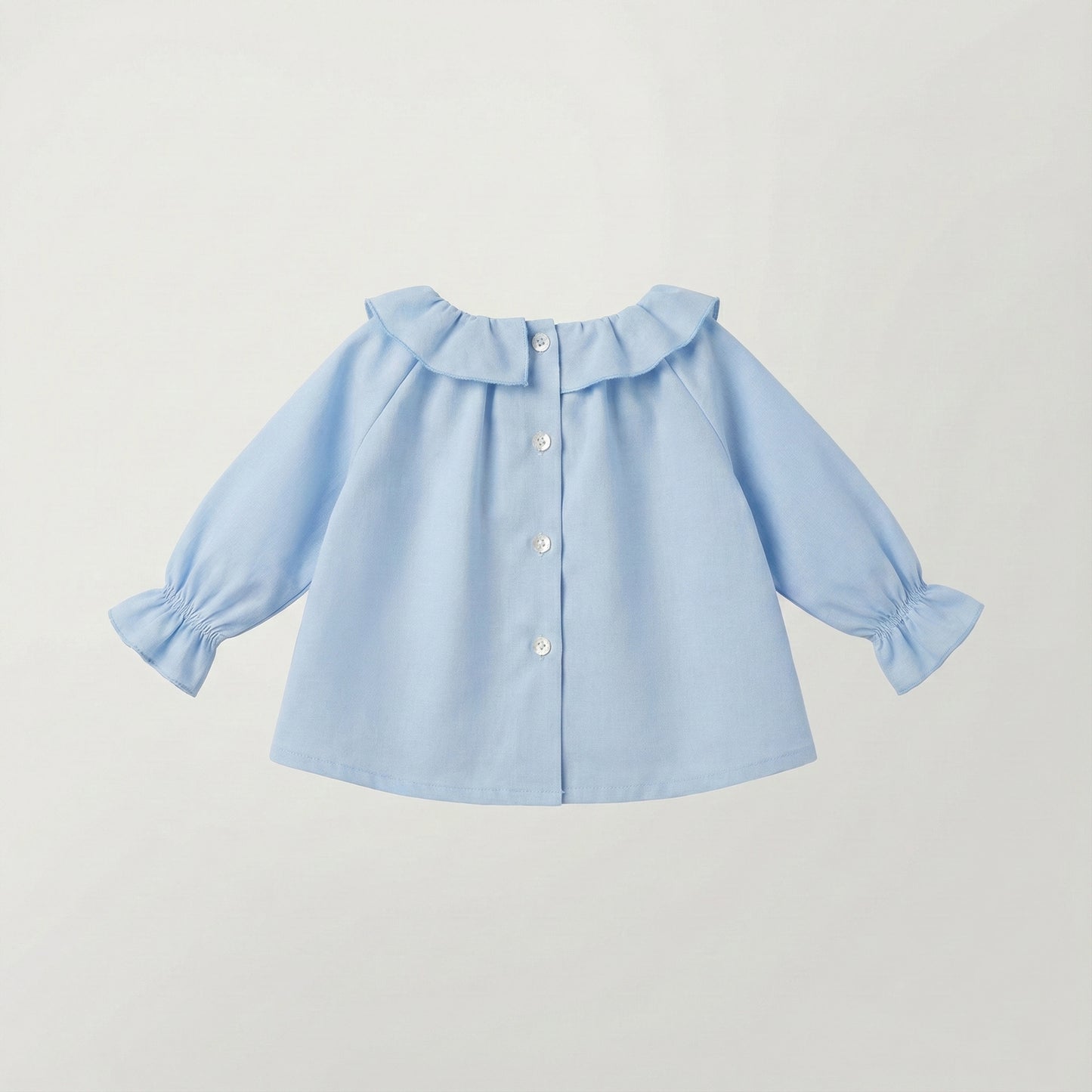 Blusa cuello corazón azul