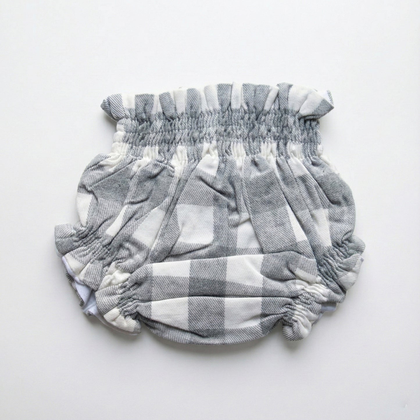 Cubrepañal cuadros grises