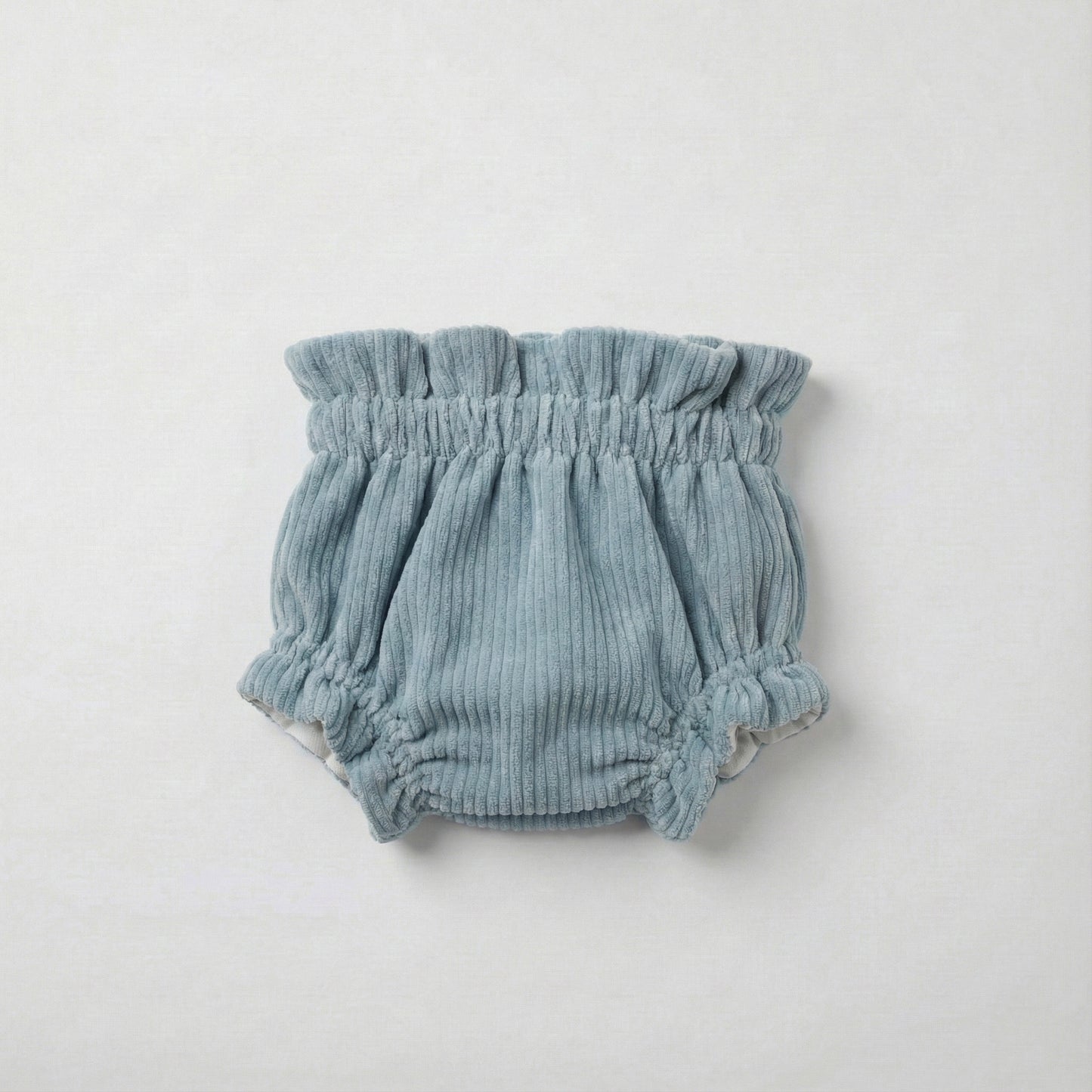 Cubrepañal pana azul