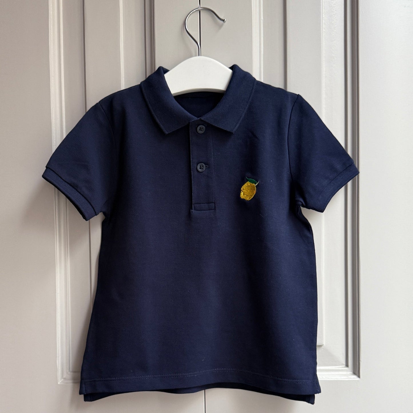 Polo marino bordado