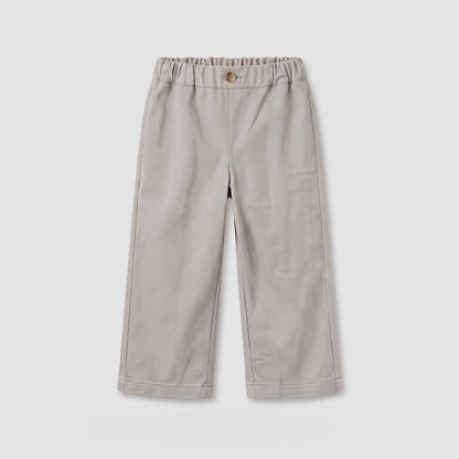 Pantalón beige bolsillos bordados
