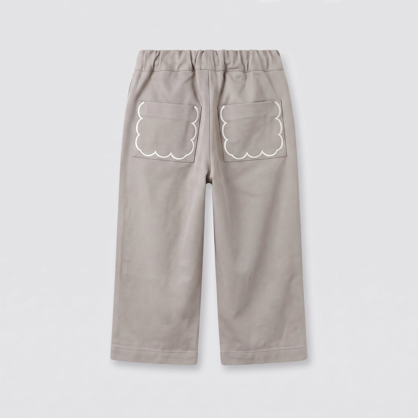 Pantalón beige bolsillos bordados
